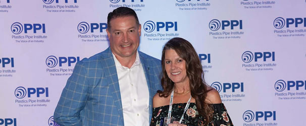 Jennifer Reeves, having been presented with the member of the year award by PPI president David M Fink
